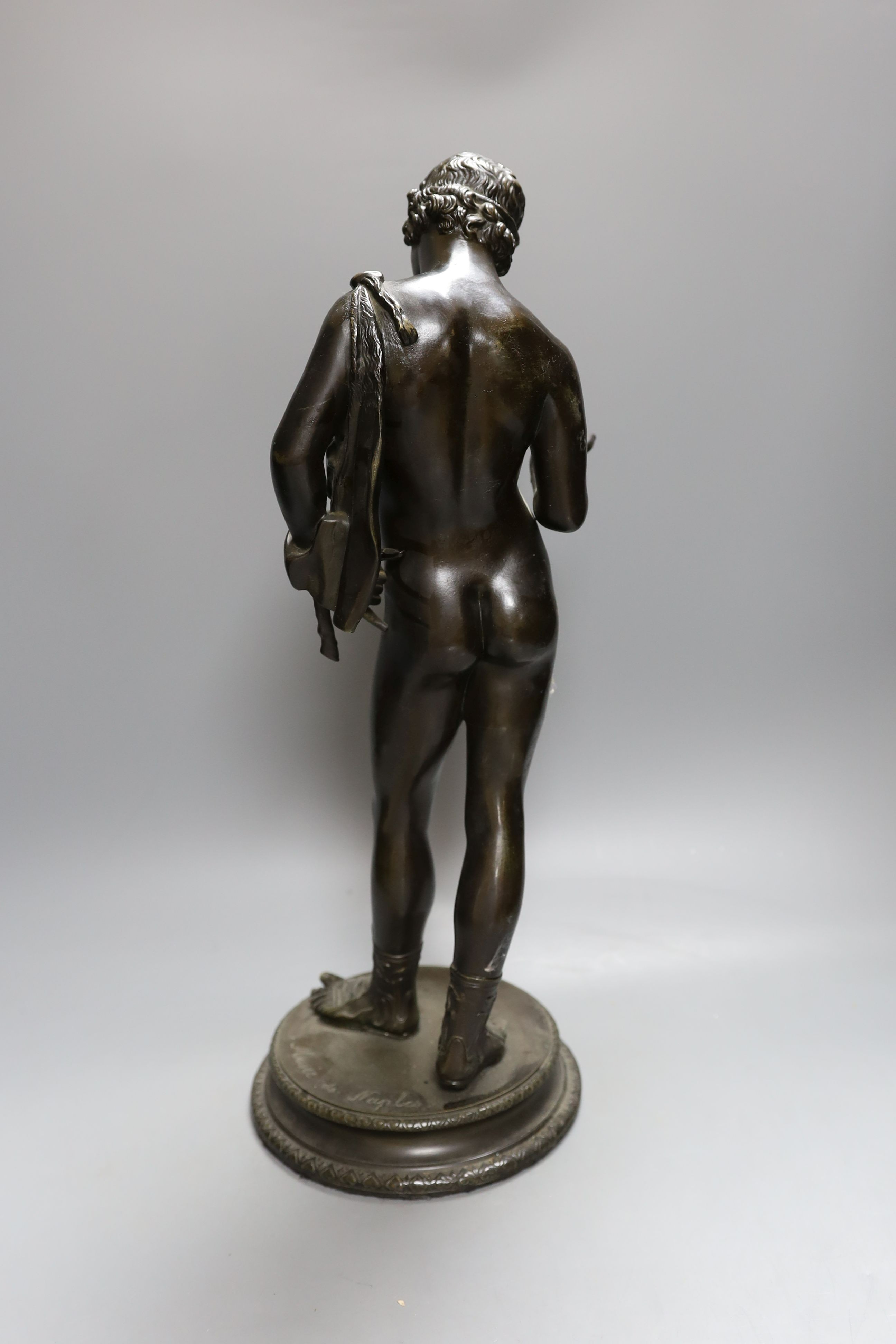 A bronze figure of Narcissus, marked Musee de Naples. 49cm
